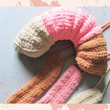 Crocheted neck pillow and sleep masks.